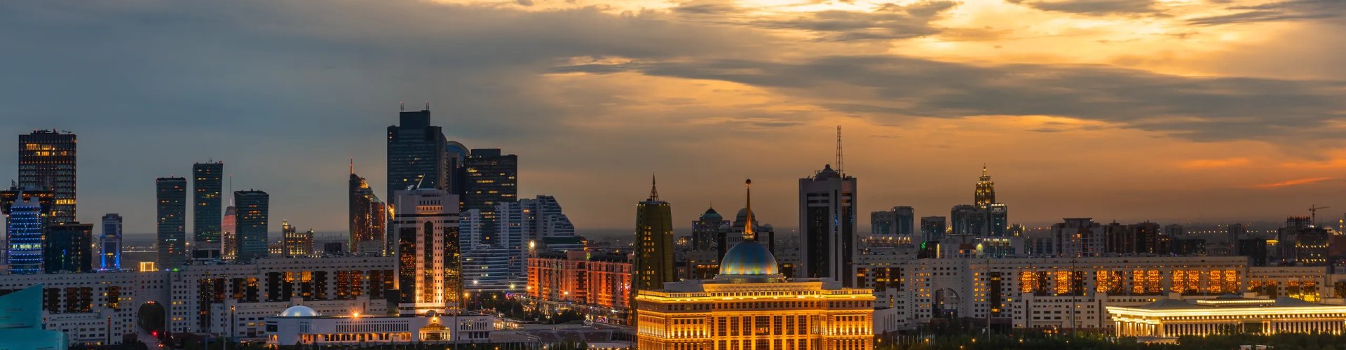 Evening riverside shot of Astana, KZ