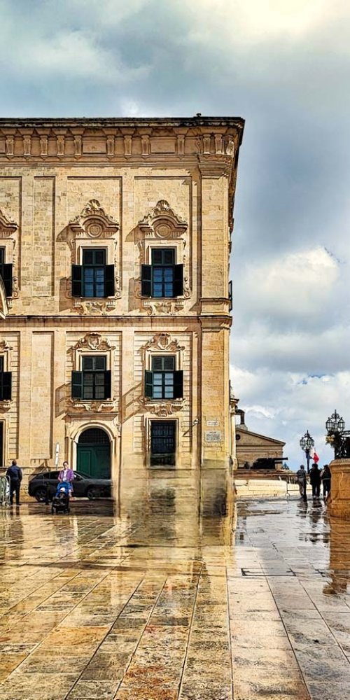Street in Valletta with people walking