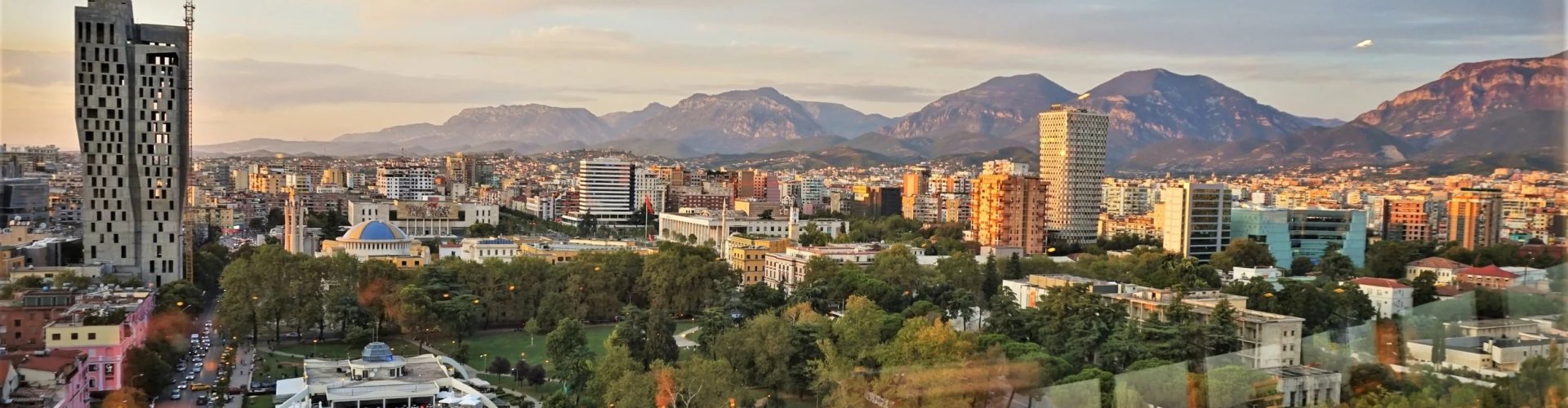 Evening riverside shot of Tirana, AL