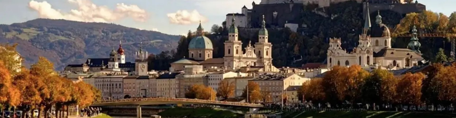 Evening riverside view of Salzburg, AT